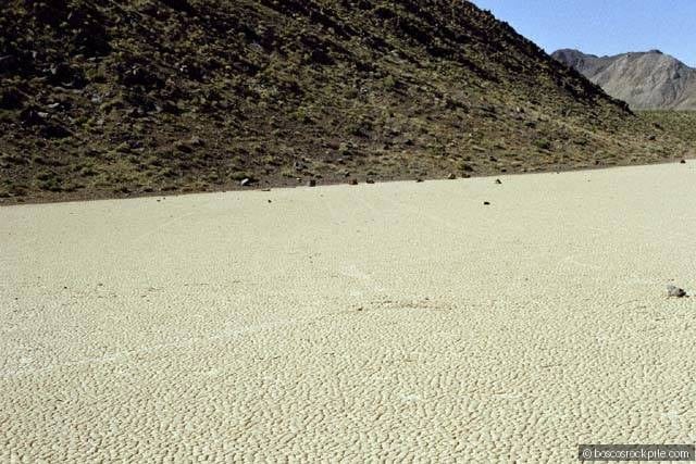 Racetrack Playa — the cracked dry lakebed where 'sailing stones' slide across the mud, leaving long trails behind them.